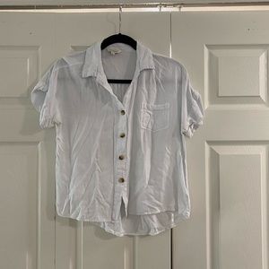 White button up slightly copped shirt